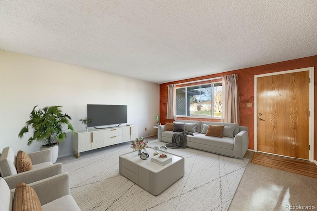 772 Urban Ct, Lakewood, CO 80401 - carpeted living room with a textured ceiling
