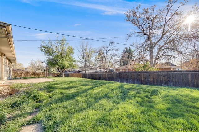 772 Urban Ct, Lakewood, CO 80401 - view of yard featuring a fenced backyard