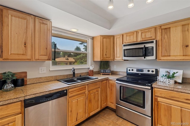 4451 Ranch Cir, Colorado Springs, CO 80918 - kitchen featuring stainless steel appliances and tile countertops