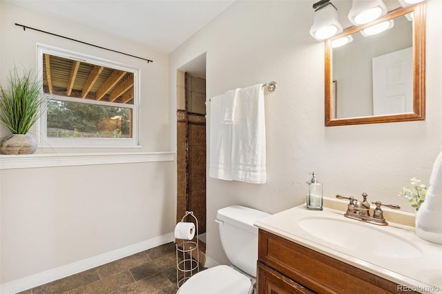 4451 Ranch Cir, Colorado Springs, CO 80918 - full bathroom with vanity, a shower, and stone finish floors