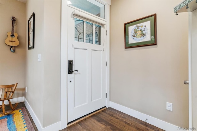 1160 S Sherman St, Denver, CO 80210 - entryway featuring baseboards and dark wood-type flooring