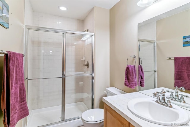 1160 S Sherman St, Denver, CO 80210 - full bath featuring toilet, vanity, a shower stall, and recessed lighting