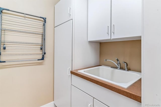 1160 S Sherman St, Denver, CO 80210 - laundry room featuring a sink