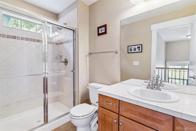 1160 S Sherman St, Denver, CO 80210 - bathroom featuring toilet, vanity, and a stall shower