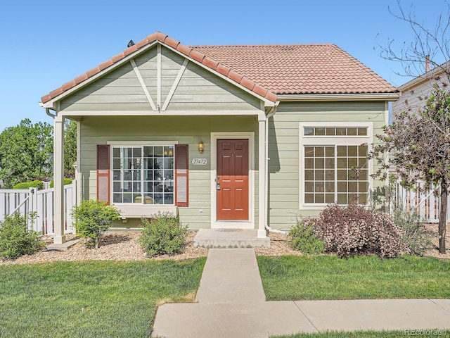 21472 E 46th Ave, Denver, CO 80249 - view of front of house with a tile roof
