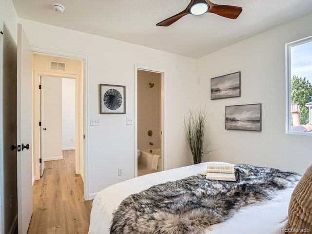21472 E 46th Ave, Denver, CO 80249 - bedroom with light wood-style floors, baseboards, and a ceiling fan