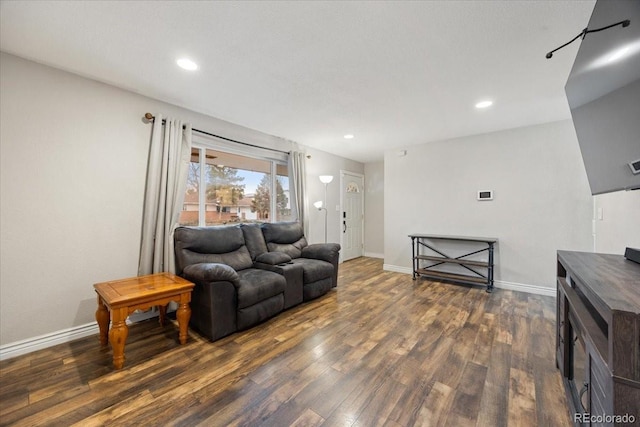 2121 Carmel Dr, Colorado Springs, CO 80910 - living area featuring recessed lighting, dark wood-type flooring, and baseboards