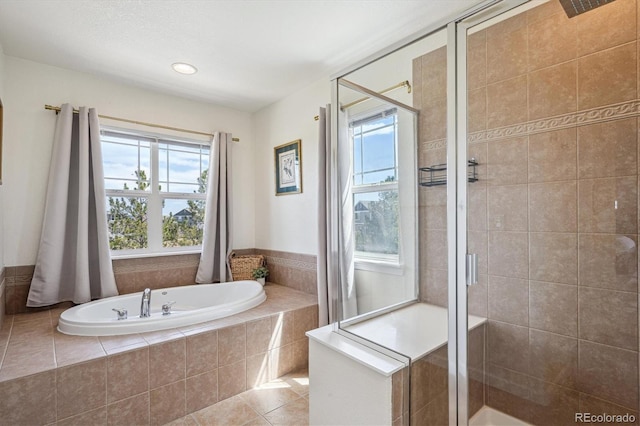 bathroom featuring tile patterned floors, a shower stall, recessed lighting, and a bath