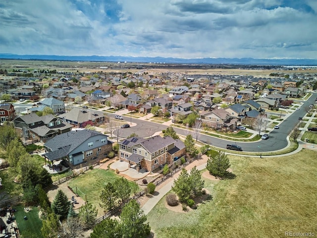 birds eye view of property with a residential view
