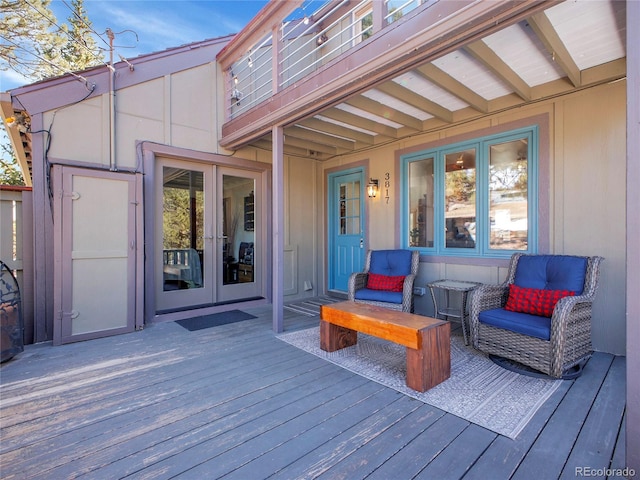 wooden terrace featuring french doors