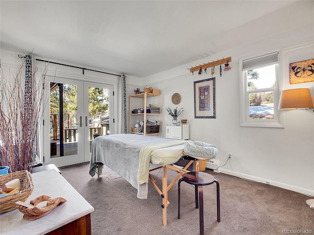 carpeted bedroom with access to exterior, multiple windows, french doors, and baseboards