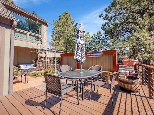 deck featuring outdoor dining space