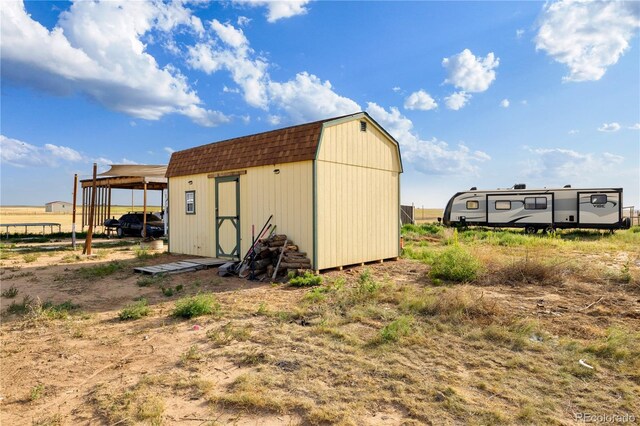 view of shed with a carport