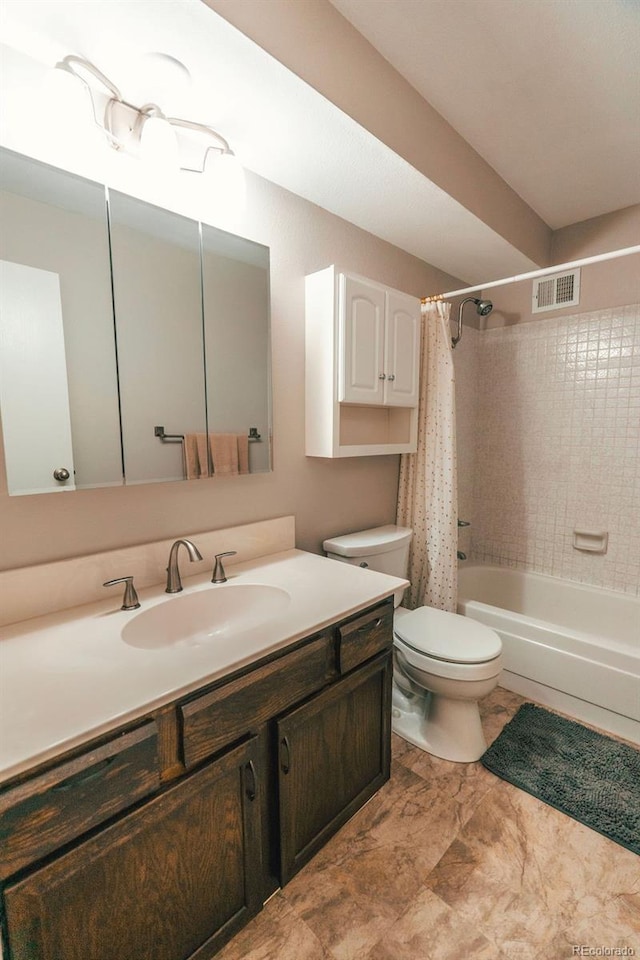 bathroom featuring visible vents, vanity, toilet, and shower / bath combo with shower curtain