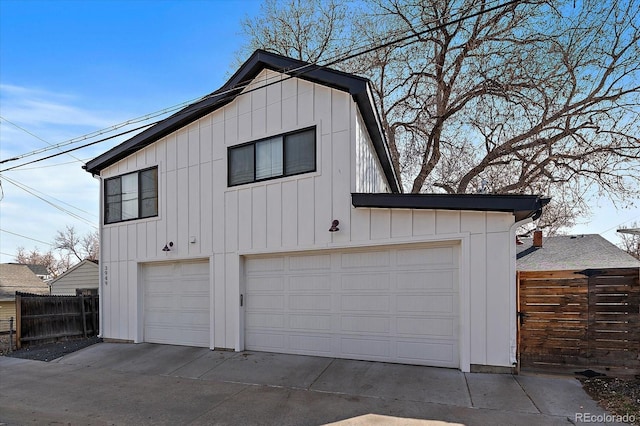 garage featuring fence