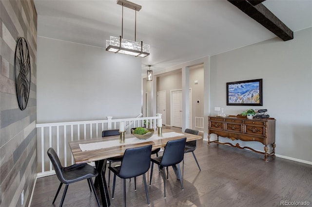 dining area with dark wood-style flooring, visible vents, beamed ceiling, and baseboards