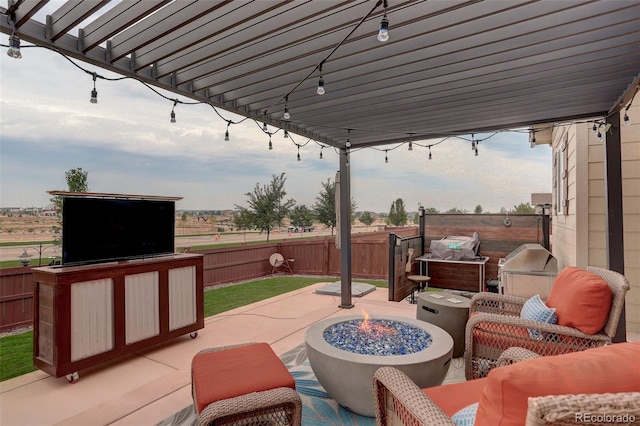 view of patio / terrace with a grill, fence, a pergola, and an outdoor living space with a fire pit