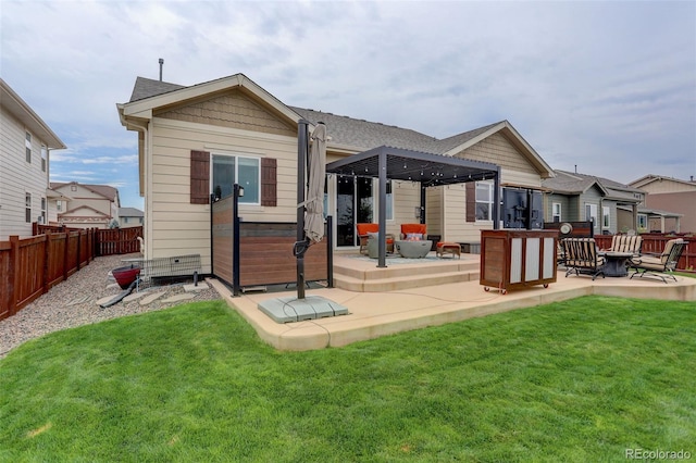 rear view of house with a patio, fence, a lawn, and a pergola