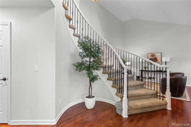 9453 Lark Sparrow Dr, Highlands Ranch, CO 80126 - stairway with wood finished floors, lofted ceiling, and baseboards