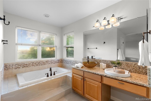 9453 Lark Sparrow Dr, Highlands Ranch, CO 80126 - bathroom featuring vanity, a bath, and tile patterned floors