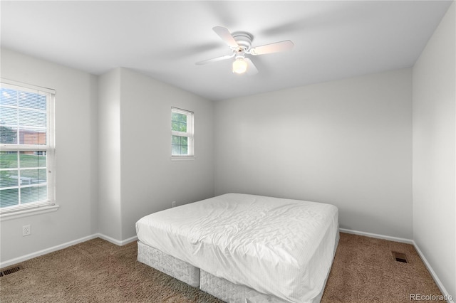 9453 Lark Sparrow Dr, Highlands Ranch, CO 80126 - bedroom featuring carpet, baseboards, and a ceiling fan