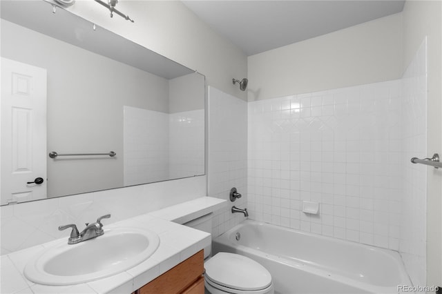 9453 Lark Sparrow Dr, Highlands Ranch, CO 80126 - full bath featuring vanity, decorative backsplash,  shower combination, and toilet