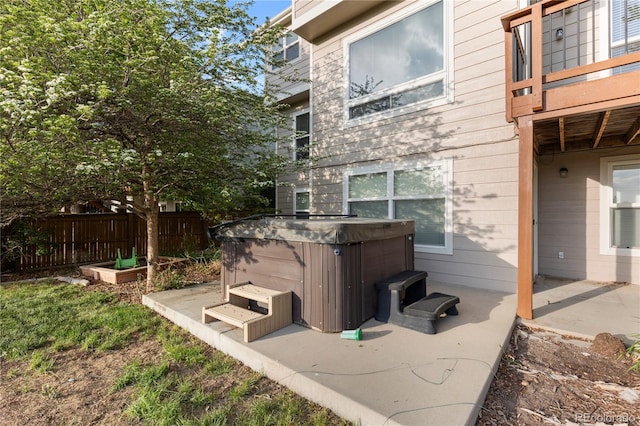 9453 Lark Sparrow Dr, Highlands Ranch, CO 80126 - view of side of home with a hot tub, a patio, and a balcony