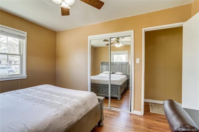 1881 E 95th Ave, Thornton, CO 80229 - bedroom featuring baseboards, ceiling fan, a closet, and wood finished floors