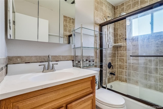 1881 E 95th Ave, Thornton, CO 80229 - full bathroom with toilet, enclosed tub / shower combo, and vanity