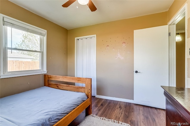 1881 E 95th Ave, Thornton, CO 80229 - bedroom with baseboards, a ceiling fan, wood finished floors, and a closet