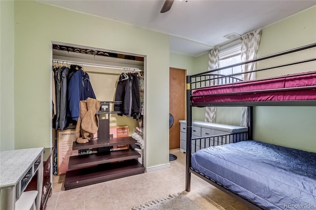 1881 E 95th Ave, Thornton, CO 80229 - bedroom with a ceiling fan, tile patterned floors, and a closet