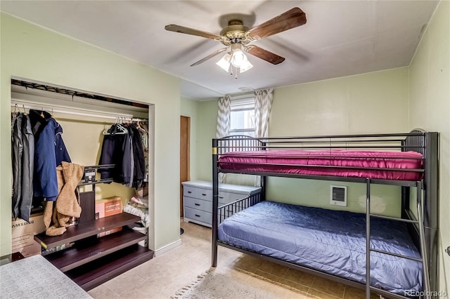 1881 E 95th Ave, Thornton, CO 80229 - tiled bedroom with ceiling fan and a closet