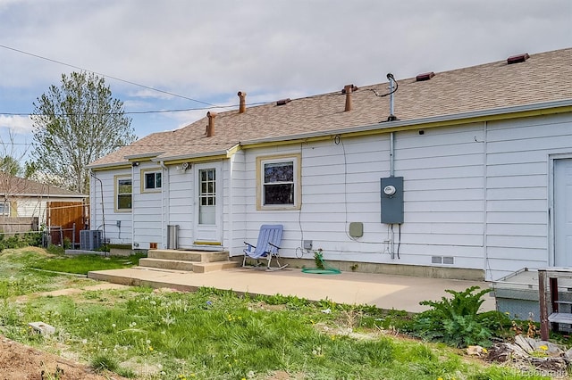 1881 E 95th Ave, Thornton, CO 80229 - back of house with central AC unit, a patio area, fence, and entry steps