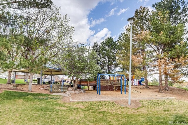 1881 E 95th Ave, Thornton, CO 80229 - communal playground featuring a lawn