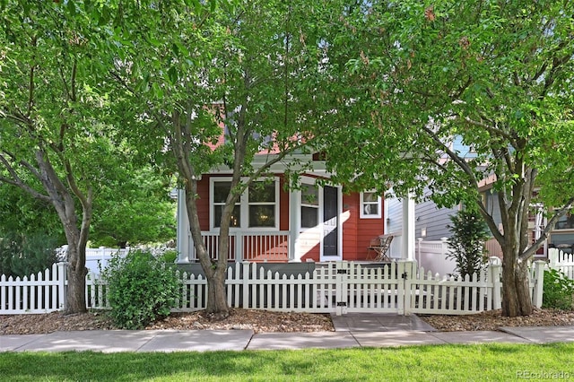 2813 Central Park Blvd, Denver, CO 80238 - obstructed view of property with a fenced front yard