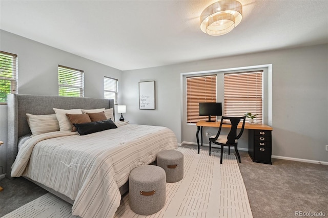 2813 Central Park Blvd, Denver, CO 80238 - bedroom with multiple windows, baseboards, and carpet