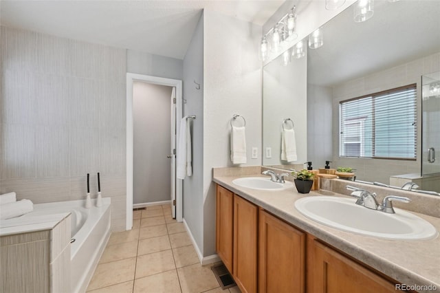 2813 Central Park Blvd, Denver, CO 80238 - bathroom with a bath, double vanity, tile patterned flooring, and a shower with door