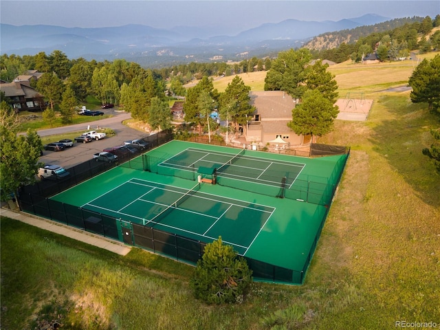 drone / aerial view featuring a mountain view