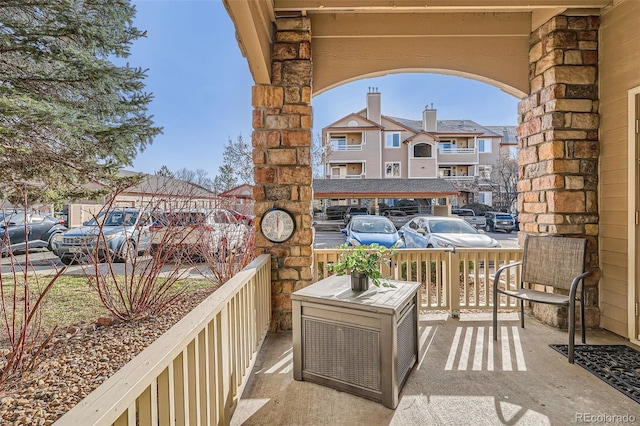 view of patio with a residential view and area for grilling