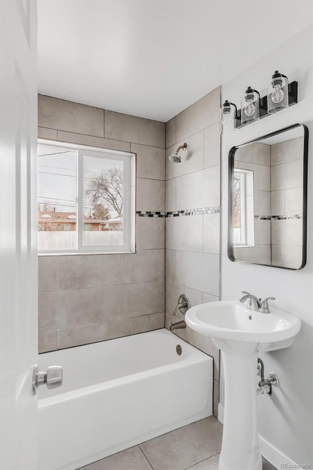 full bath with shower / tub combination and tile patterned floors