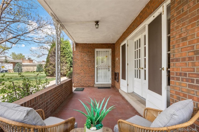 balcony featuring a porch