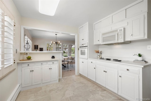 kitchen with white cabinetry, white appliances, a notable chandelier, and a baseboard heating unit
