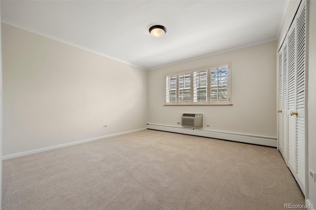 unfurnished bedroom with ornamental molding, a baseboard radiator, a wall mounted air conditioner, and carpet flooring