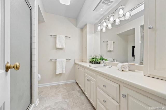 full bath featuring toilet, baseboards, visible vents, vanity, and an enclosed shower