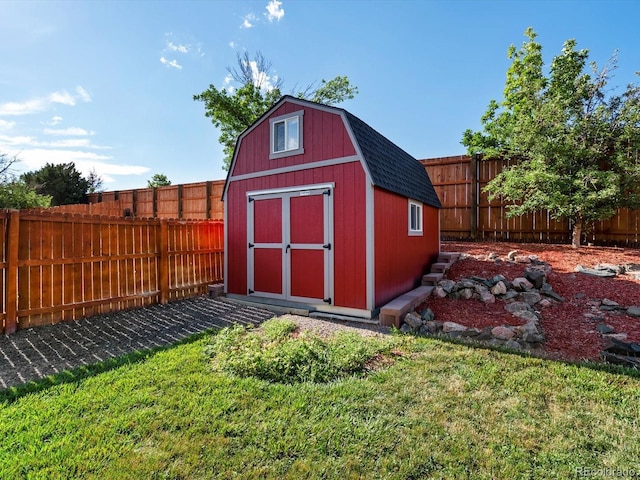 11877 W Bowles Cir, Littleton, CO 80127 - view of shed with a fenced backyard