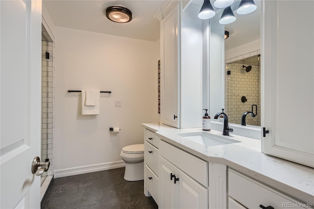 bathroom featuring tile patterned floors, vanity, and toilet