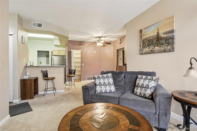 4545 Wheaton Dr Unit B210, Fort Collins, CO 80525 - living area featuring light carpet and a ceiling fan