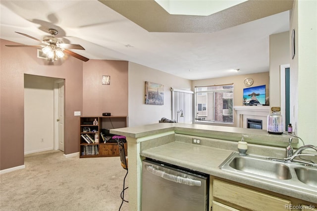 4545 Wheaton Dr Unit B210, Fort Collins, CO 80525 - kitchen with dishwasher, light carpet, a ceiling fan, and light countertops