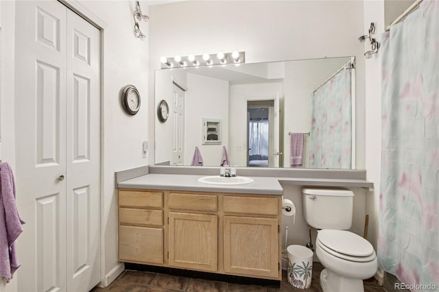 4545 Wheaton Dr Unit B210, Fort Collins, CO 80525 - full bath with vanity, curtained shower, and tile patterned flooring