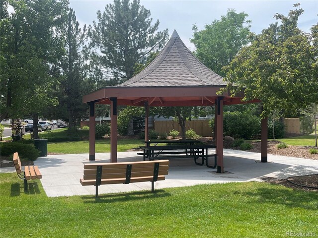 view of home's community with a gazebo and a yard